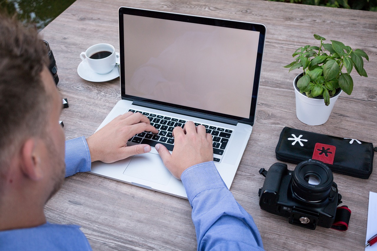 Sample restaurant website design displayed on a laptop